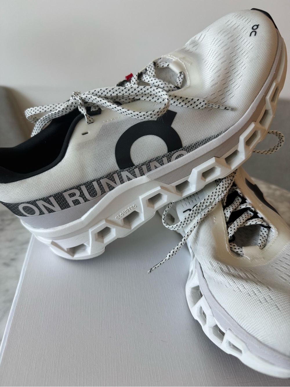 On Running White and Black CloudTec Sneakers